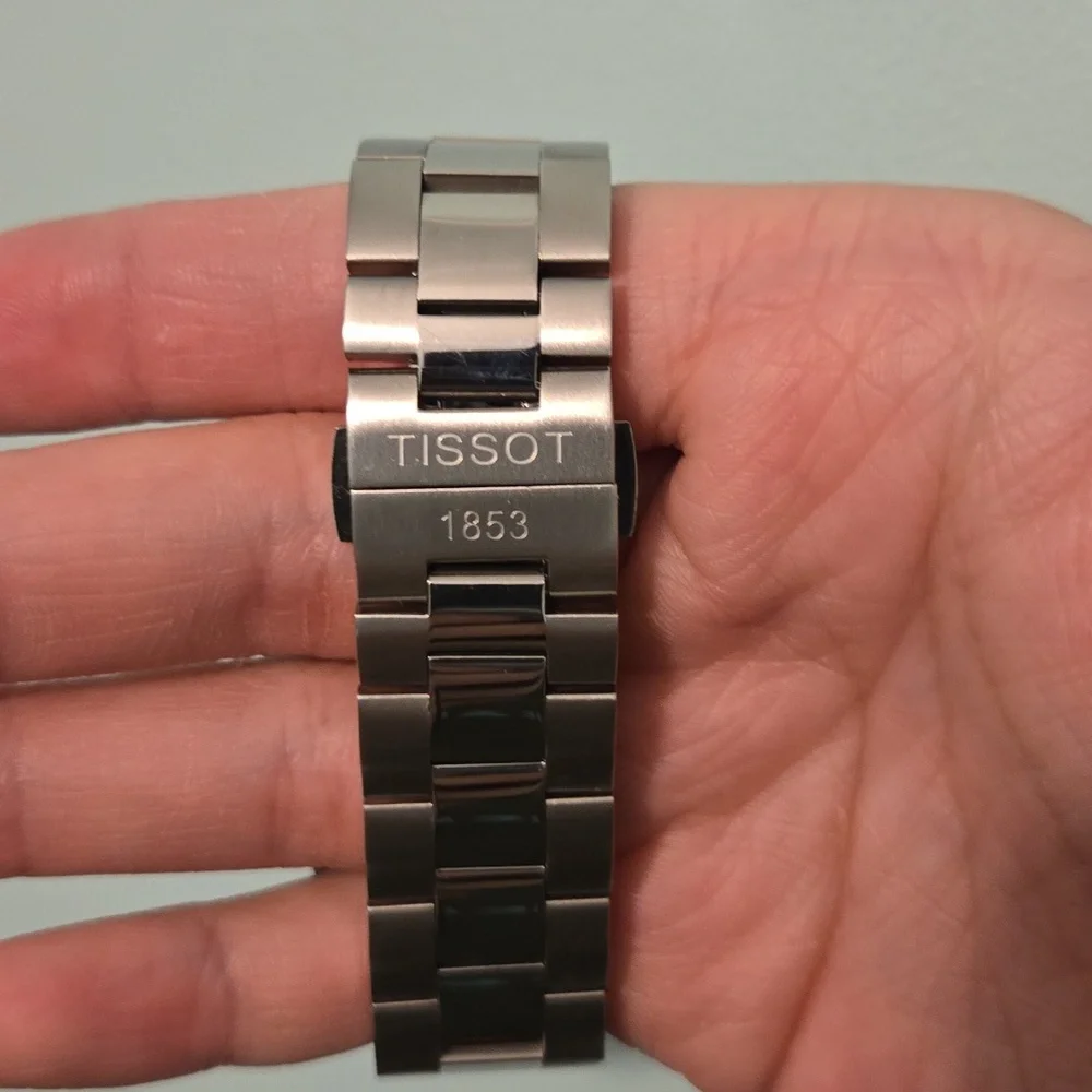 Tissot Men's Navy Blue Dial Silver Case Black Leather Strap Watch